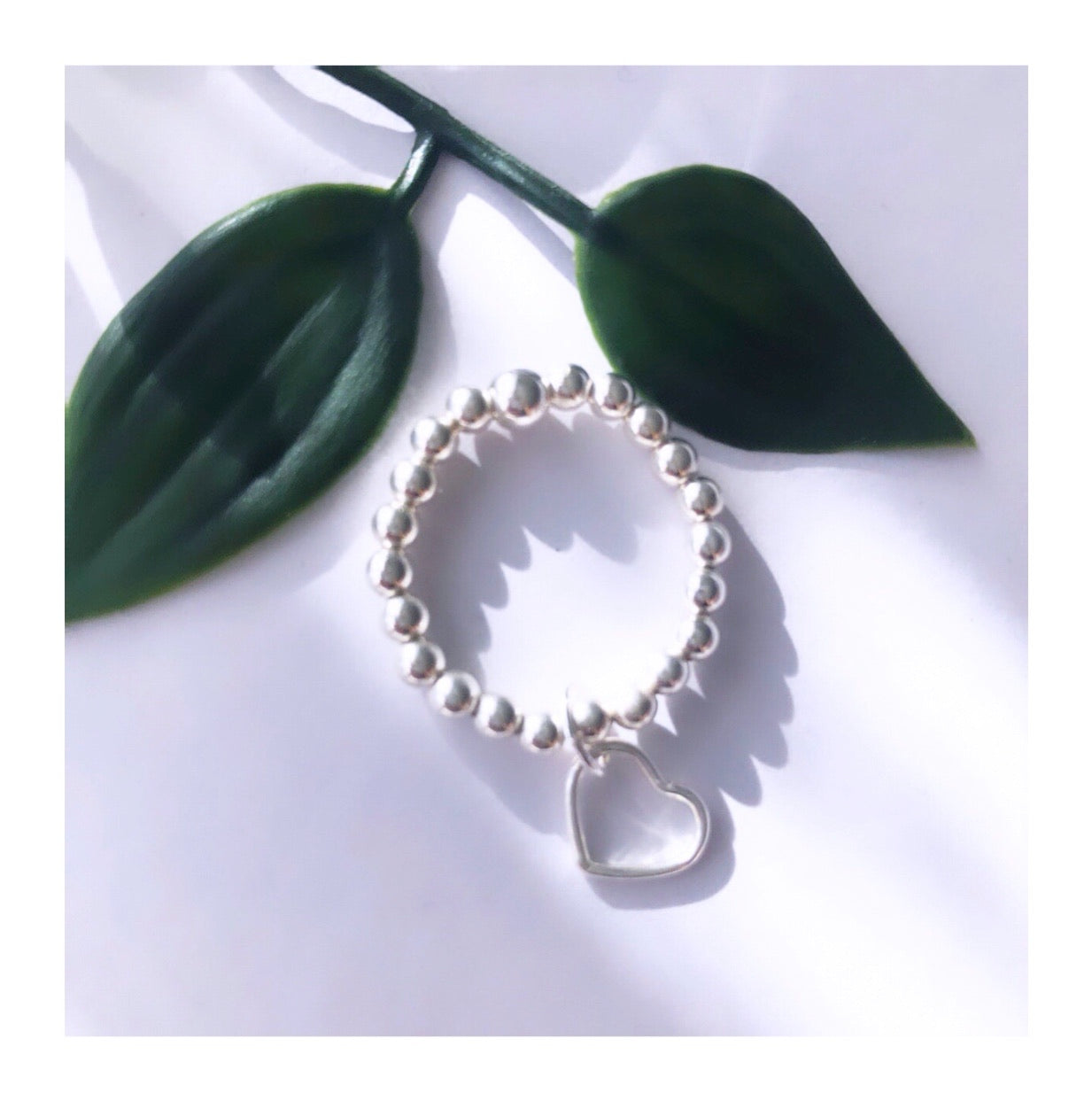 bohochic silver stacking ring with heart, product shot